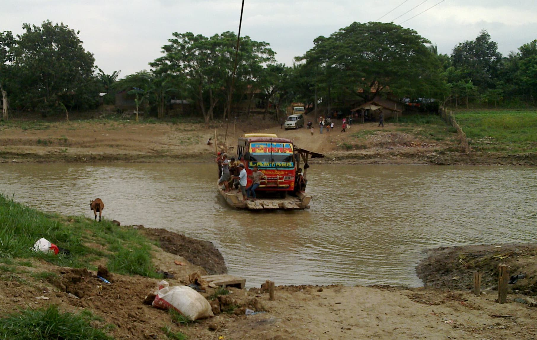 Raft use to bridge car, truck and bus across Citarum River at Batujaya, Karawang, West Java, Indonesia