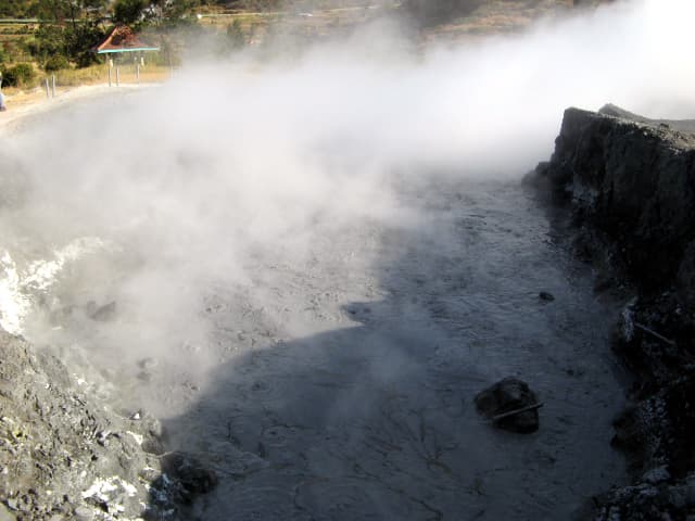 The Dieng plateau, an active caldera, is an area of intense and sometimes dangerous volcanic activity. Hydrogen sulfide gas, with its characteristic o